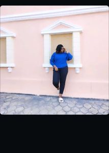 Blue Pullover & Black Pants