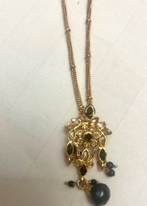 Elegant Gold and Black Necklace