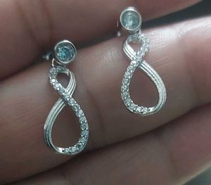Elegant Infinity Earrings, 925 silver, caratlane