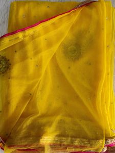 Elegant Yellow Saree with Pearl Details