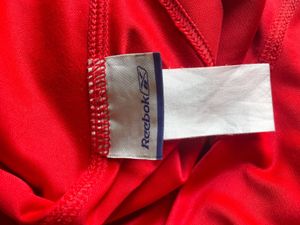 Show your Reds pride with the official Reebok