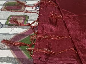 Maroon Shiny Plain Saree From Chillori With Floral Blouse.