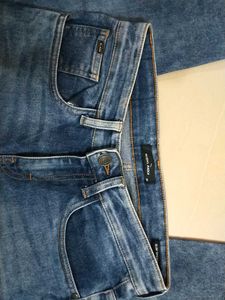 Highlander Brand Slim Tapered Jeans