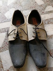 black white polished formal shoes