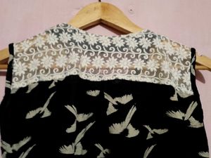 Chic Bird Print Sleeveless Top