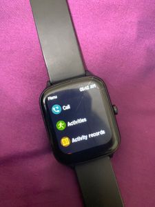 Sleek Black Smartwatch With Charger