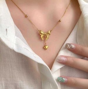 Gold Ribbon Heart Necklace