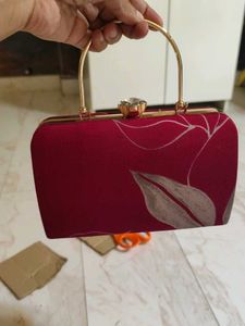 Maroon Printed Leaf Hand Clutch With Sling
