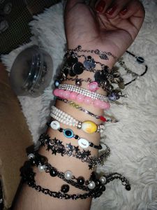 2 Bracelets With One Ring
