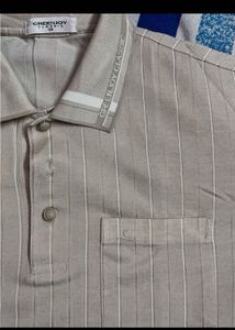 Green Joy Classic Tan colored striped polo shirt