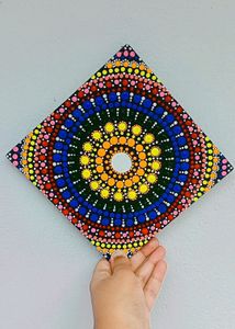 Its a handmade mandala art or dot art