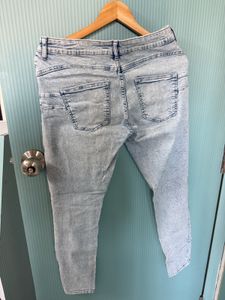 Ripped Light blue denim jeans for women