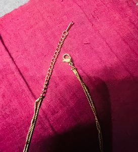 golden and silver pendent combo