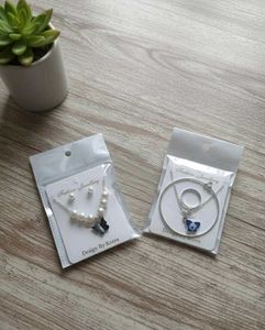 Layered Pearl &amp; Charm Necklace