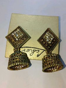 2 sets of ethnic earrings with golden detailing