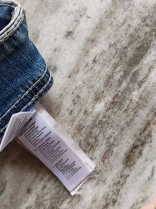 Ripped Blue Denim Jeans