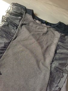 Elegant Black Top with Ruffle Sleeves