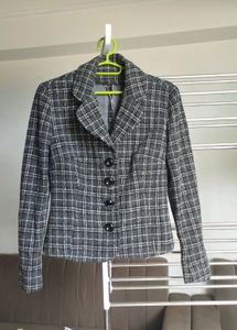 Black striped long sleeve blazer.