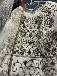 cream full hand work Chaniya choli wid net dupatta
