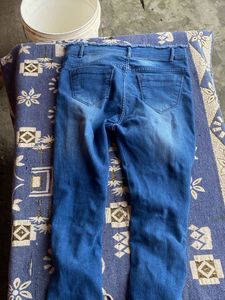 Distressed Lace-Up Jeans