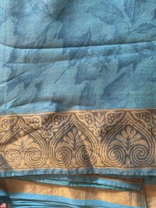 Blue Net Saree With Cream Border