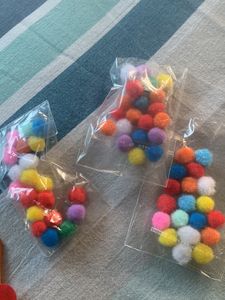 Colourful Sticks And Cotton Pom Po