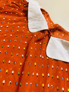 Collared Polka Dot Peplum Top