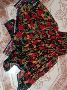 Beautiful Black Gown With Red And Green Design