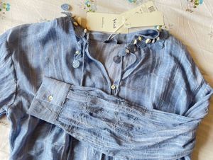 loose fit resort shirt with shell detail