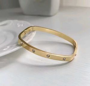 Gold-Tone Bangle with Accents