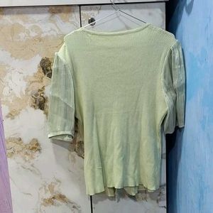 mint green knit top with embroidery