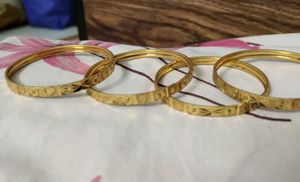 4 golden bangles