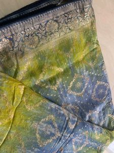 blue and yellow blend saree with golden work