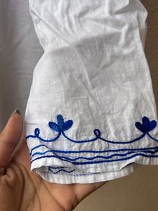 Short Kurti With Blue Work On It