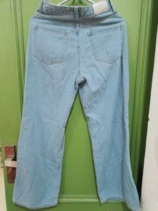 Ripped Jeans with Graffiti