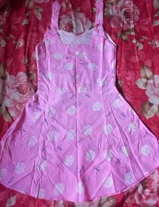 Pink Sundress with White Dot Pattern.