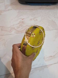 Mustard round Embroidered Clutch