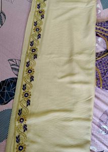 Elegant Creme Saree with Purple Blouse