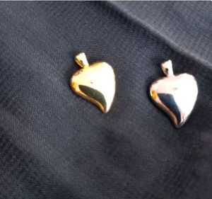 Solid Metalized Silver And Gold Plated Pendents.