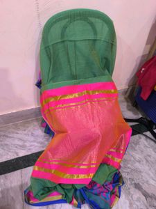 Green saree with multicolour details and glitter s