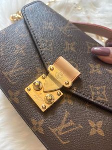 Authentic  Louis Vuitton  Metis East West