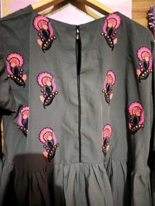 Embroidered Peplum Top