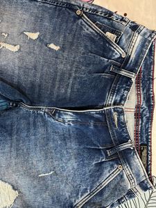 Distressed Denim Jeans