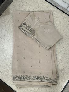 Elegant Beige Saree With A Free Blouse