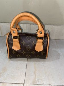 Lv Nano Speedy Bag