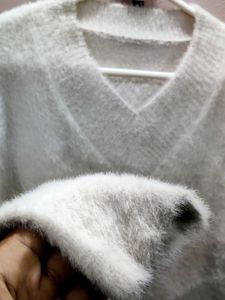 premium imported white V-neck mohair sweater.