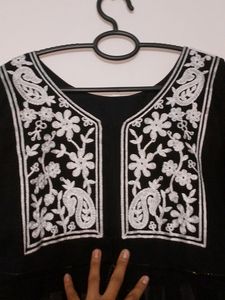 A Short Chikankari Kurti In Black Colour
