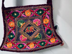 Freebie Embroidered Sling Bag