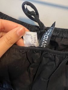 Sleeveless Peplum Top