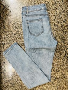 Ripped Knee Light Wash Jeans